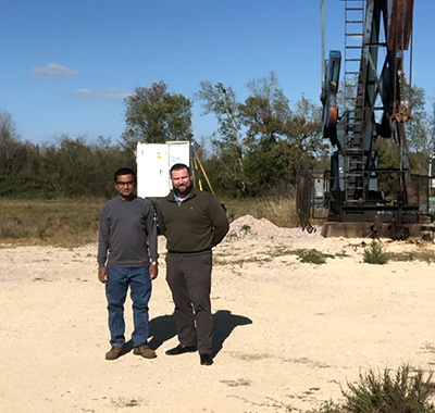 Arran standing with his colleague