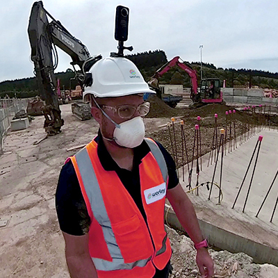 Ed wearing 360-camera on the hard hat.