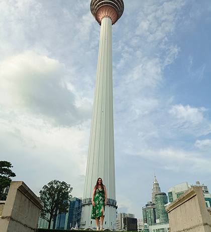 Katie standing in front of the Kuala Lumpur Tower.