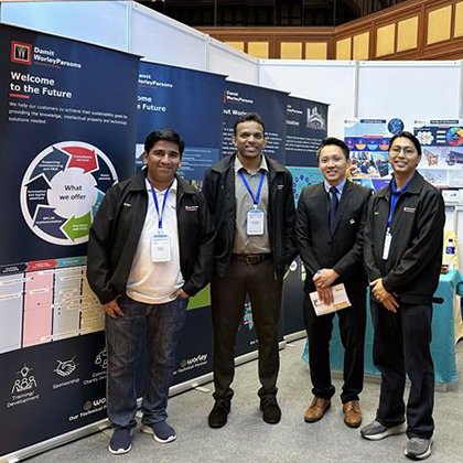 Kanada and team standing at event