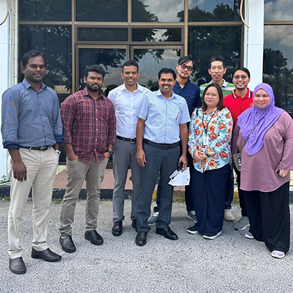 Kanada and team standing