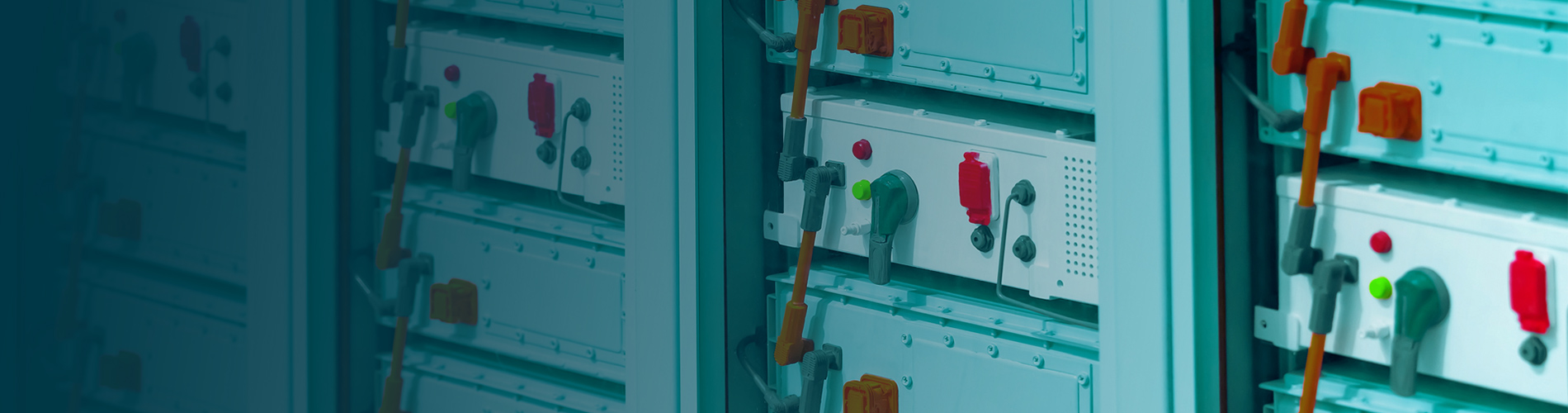 Industrial battery modules with cabling and control switches.