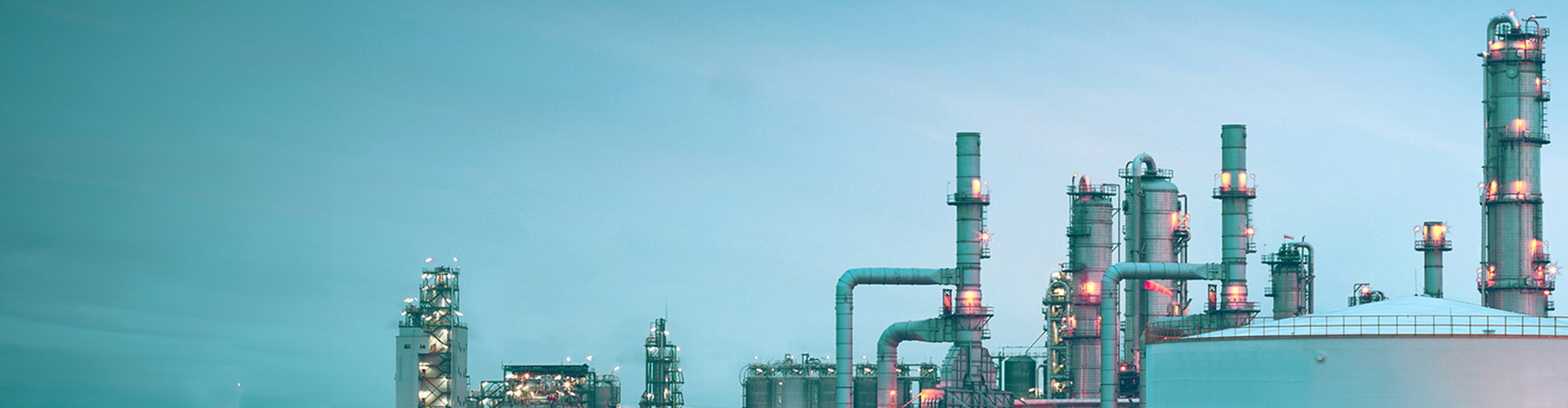 Oil refinery with storage tanks.