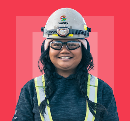Worley woman wearing a helmet and protective glasses.