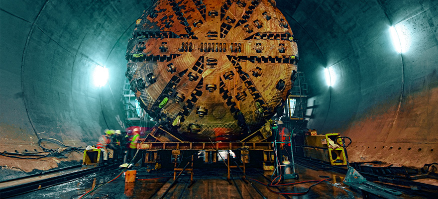 Engineers operating a tunnel boring machine.
