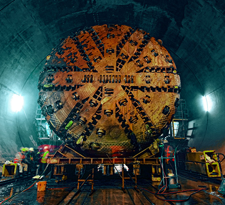 Engineers operating a tunnel boring machine.
