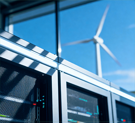 Data server with wind turbine in background.