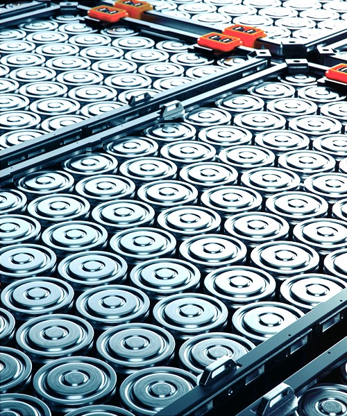 Electric vehicle battery cells stacked inside modules.