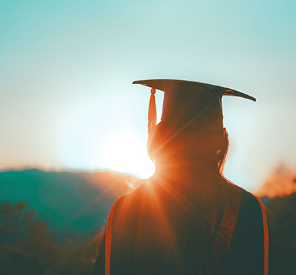 Student wearing a graduation gown.