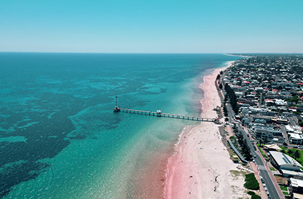 Aerial view of the Brighton Jetty from land to the water.