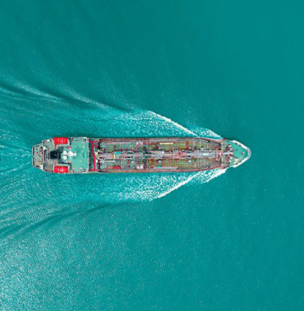 Aerial view of large ship on the water.