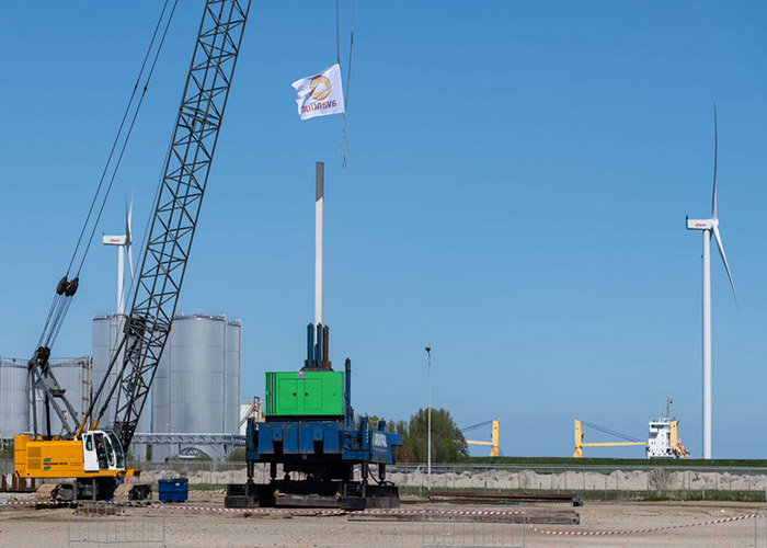 Flagship plant, crane and wind turbine.