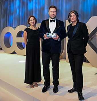 Graeme Wilson of Worley holding the award.