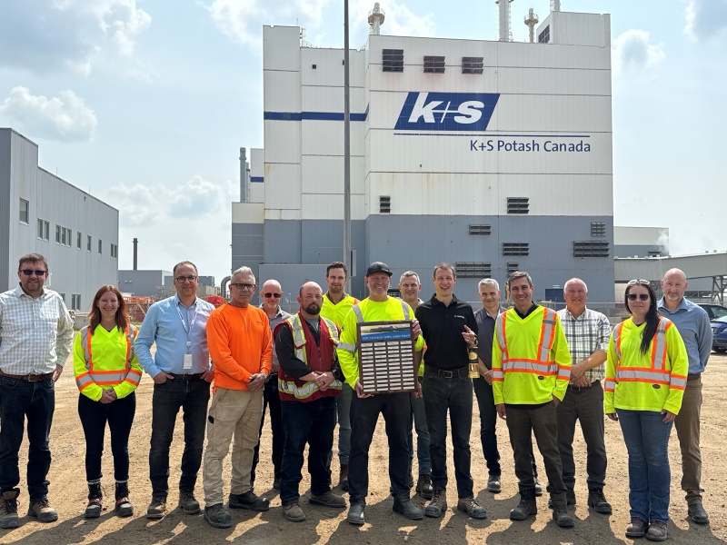 Worley team standing together in front of the K+S Potash Canada building.