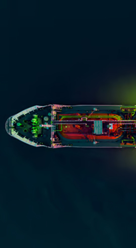 Aerial view of a tanker in dark water.